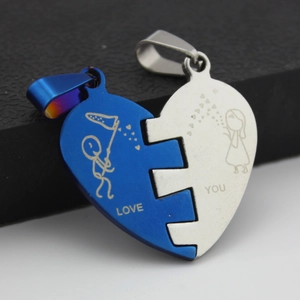 Polished stainless steel couple's puzzle heart necklace featuring romantic love you engraving
