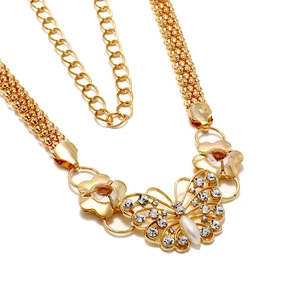 Golden mesh waist chain with hollow diamond-studded butterfly and pearl accent