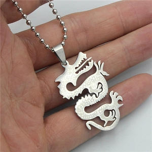 Polished stainless steel dragon pendant necklace with detailed scales and bead chain