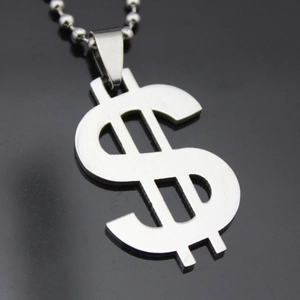Macro shot of polished stainless steel dollar sign pendant with silver bead chain