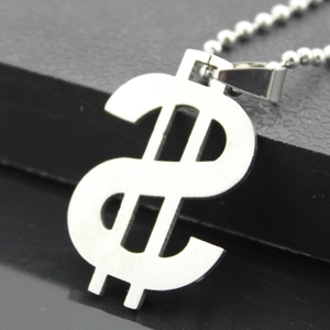 Macro view of silver dollar sign pendant featuring a brushed metallic finish and ball chain