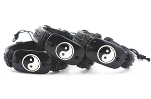 Set of three handmade black leather braided bracelets with Yin Yang Tai Chi charms