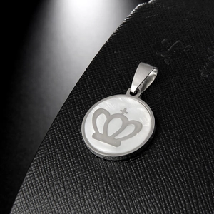 Elegant stainless steel crown necklace with round shell pendant and silver metallic finish