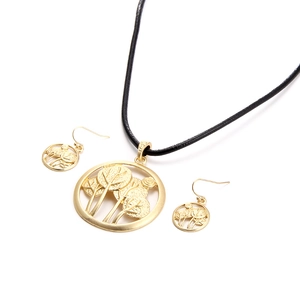 Parure arbre de vie dorée avec collier à pendentif rond et boucles d'oreilles assorties