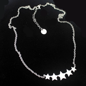 Polished stainless steel necklace featuring a minimalist five-pointed star pendant design