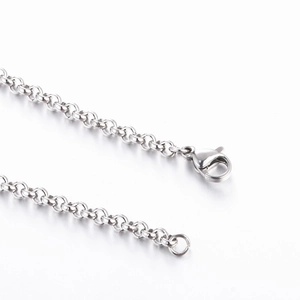 Polished stainless steel rolo chain necklace featuring a durable metal lobster clasp closure