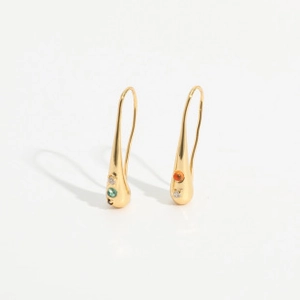 Detailed close-up of gold plated teardrop earrings with colorful gemstone accents