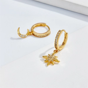 Asymmetric star and moon hoop earrings in 14k gold plated copper with cubic zirconia