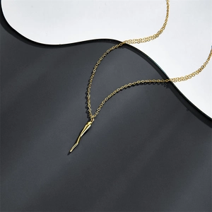 Elegant gold Italian horn pendant necklace with minimalist polished finish on a modern O-chain