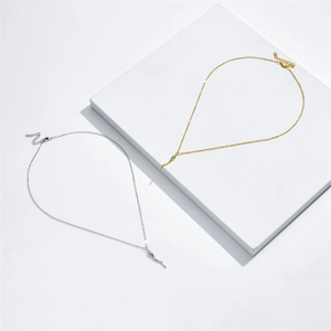 Golden and silver Italian cornicello horn pendant necklace with polished mirror finish