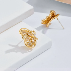 Elegant 14k gold plated brass butterfly stud earrings with hollow design and clear zircon