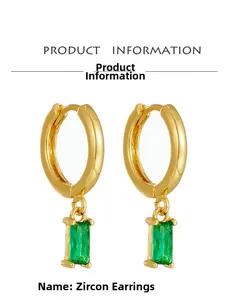 Detailed view of elegant gold-plated drop earrings featuring rectangular green zircon crystals