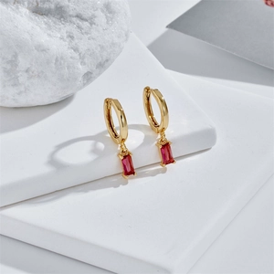 Minimalist gold plated hoop earrings featuring a rectangular red zircon stone pendant