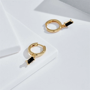 Elegant gold-plated hoop earrings with rectangular black zircon pendants in minimalist style