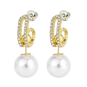 Detail of gold water drop earrings with micro-pave crystals and hanging round faux pearl