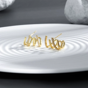 Elegant 18k gold plated S925 silver stud earrings with multi-row zirconia on a white plate