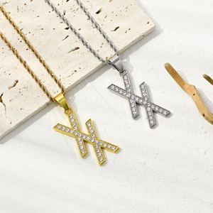 Letter X pendant necklace with cubic zirconia and twist chain in gold and silver finish