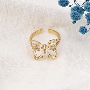 Golden butterfly open ring with clear crystal wings and adjustable brass band