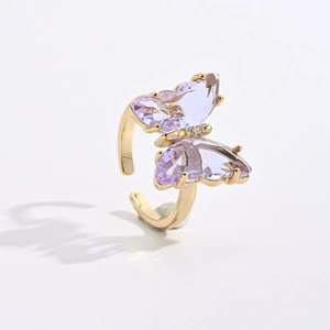 Elegant gold plated brass adjustable ring featuring a lavender crystal butterfly design