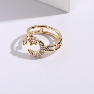 Star and moon open ring with zircon inlay and evil eye beads in gold finish