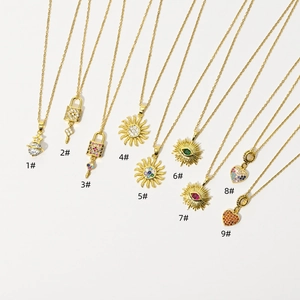 Collection of nine 14k gold plated copper necklaces with assorted zircon heart pendants
