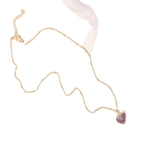 14k gold plated heart pendant necklace with purple natural stone on white silk background
