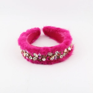 Plush faux fur headband with colorful rhinestones in rose red for party hair styling