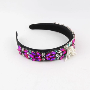Macro detail of Baroque style wide headband with pink crystals and white pearls