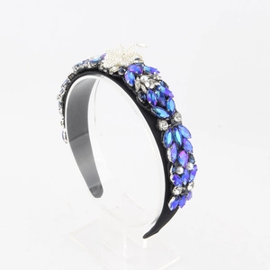 Detail view of Baroque wide headband with blue crystals, rhinestones and pearls