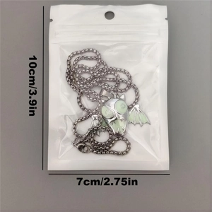 Detailed size view of punk bat pendant in protective packaging for Halloween style