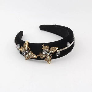 Serre-tête baroque en velours noir avec papillons dorés et strass brillants