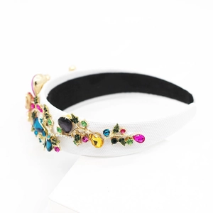 Baroque style wide headband featuring colorful crystals and vibrant floral accents