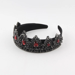 Detailed view of the vintage gothic bridal crown featuring deep red teardrop crystals