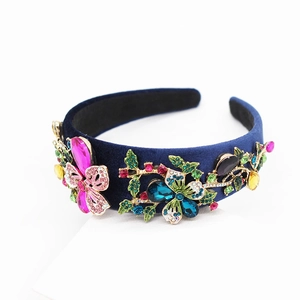 Detailed view of Baroque velvet headband with intricate colorful crystal flower patterns