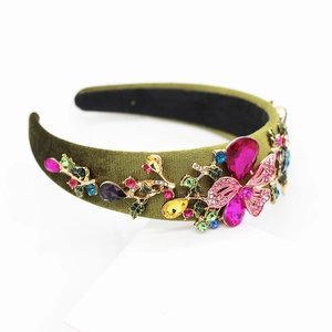 Macro detail of Baroque velvet headband with multi-color floral crystal embellishments