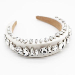 Luxury pearl white sponge headband with shimmering rhinestones in various geometric shapes
