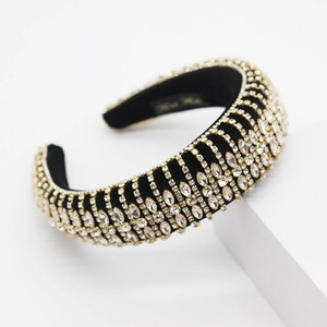Close-up of luxury velvet headband with sparkling rhinestone tassels and gold details