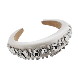 Padded white satin headband with geometric rhinestones for a luxury fashion hair accessory