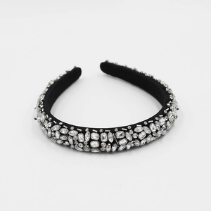 Close-up of luxury black padded headband with sparkling crystal rhinestones and beads