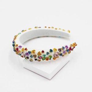 Baroque style white padded headband with colorful rhinestones and vintage crystals