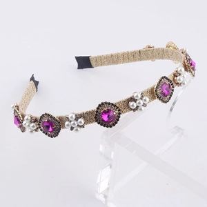 Fashion gold headband with purple crystals, pearls and sparkling diamond accents