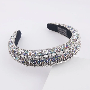 Detailed macro view of handmade colorful rhinestone padded headband with crystal embellishments