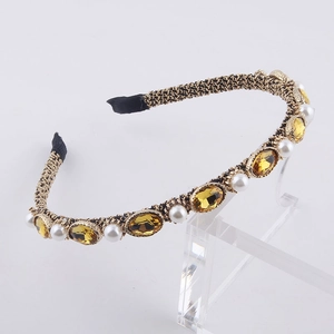 Fashionable gold wire headband with amber rhinestones and white pearls for women