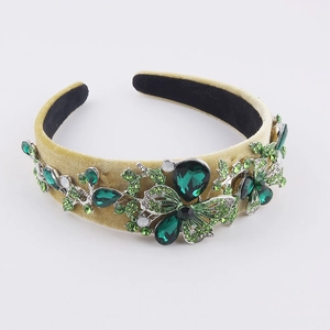Baroque floral headband with green crystals and yellow velvet finish for parties