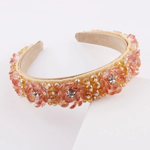 Serre-tête fleur en cristal avec pétales orange, strass et détails de perles jaunes