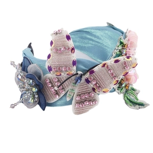 Serre-tête en velours bleu avec papillons à paillettes et fleurs en cristal brillant