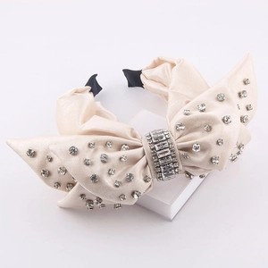 Baroque beige satin headband with crystal rhinestones and oversized bow for women