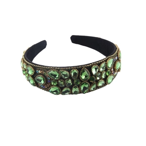 Serre-tête baroque large avec cristaux verts et accents dorés sur base velours