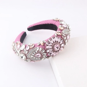 Detailed macro of pink baroque sponge headband with luxury crystals and floral rhinestones
