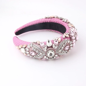 Detail of pink baroque sponge headband with sparkly crystals and woven texture